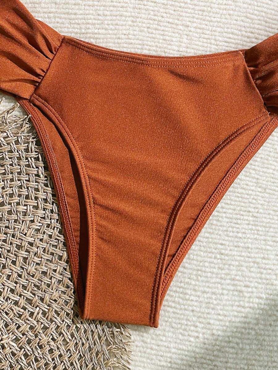 Metal Aksesuarlı Yüksek Kesim Askılı Bikini Takımı Niebbla