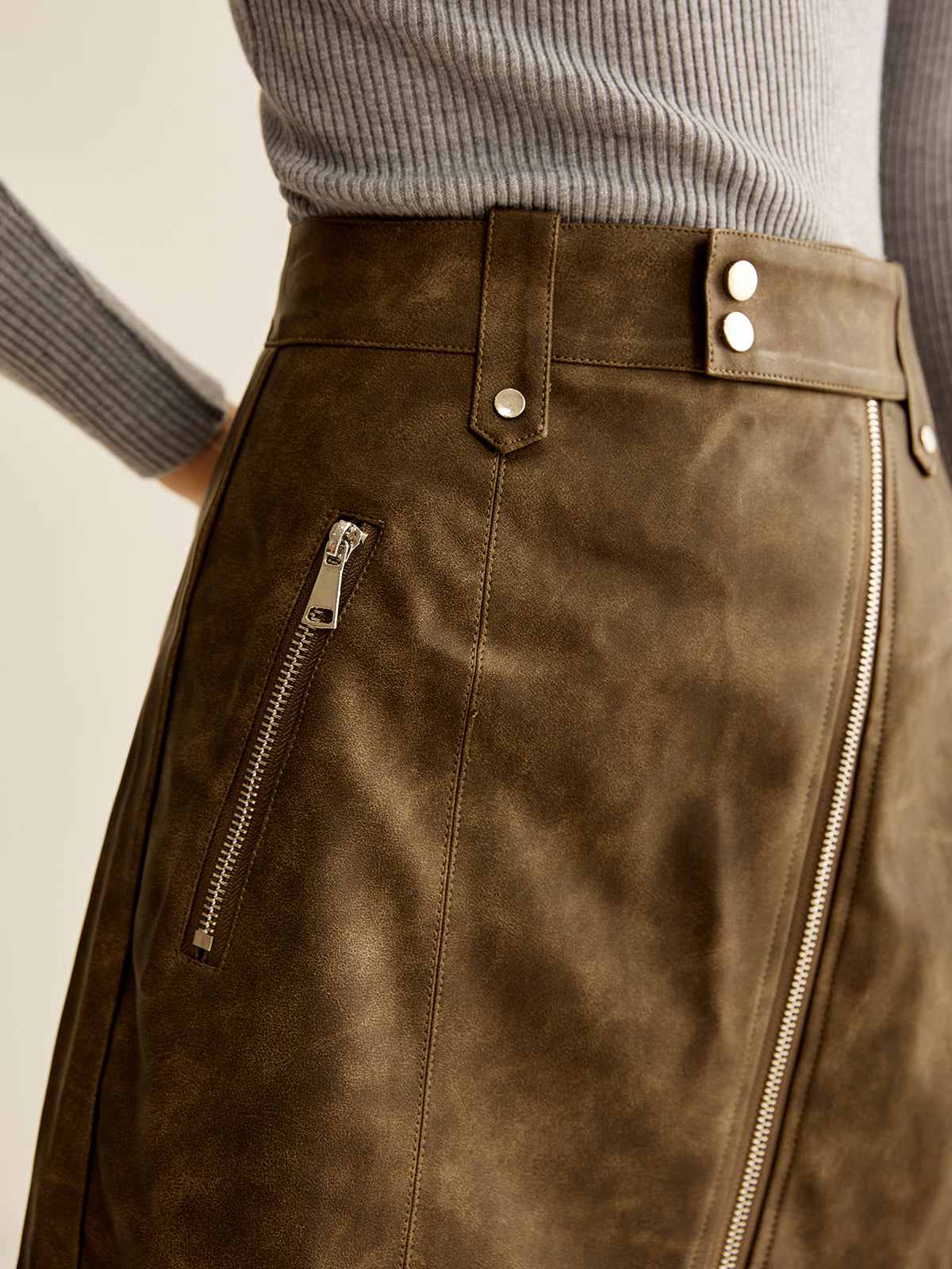 Asymmetrical Zipper Pockets Faux Leather Skirt THESVELTECHIC