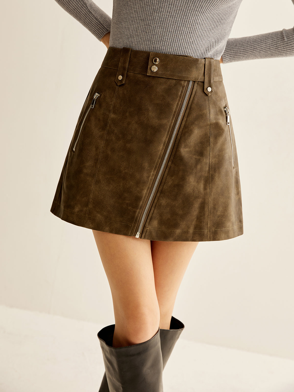 Asymmetrical Zipper Pockets Faux Leather Skirt THESVELTECHIC