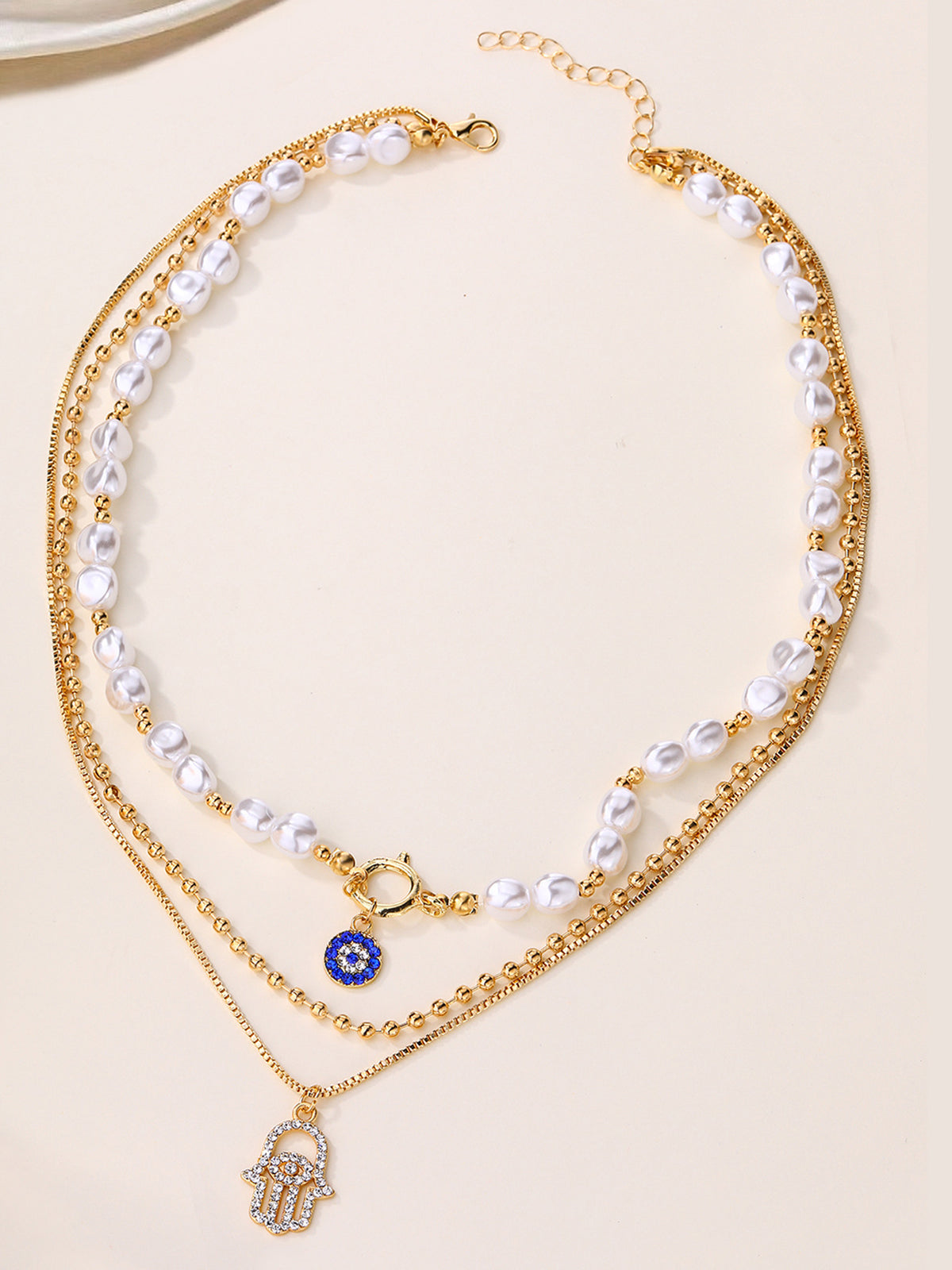 Şık Görünüm İçin İnci ve Hamsa El Desenli Çocuk Bezi Kolye Seti THESVELTECHIC