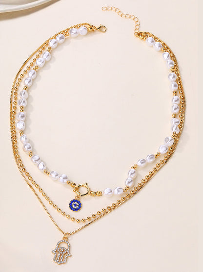 Şık Görünüm İçin İnci ve Hamsa El Desenli Çocuk Bezi Kolye Seti THESVELTECHIC